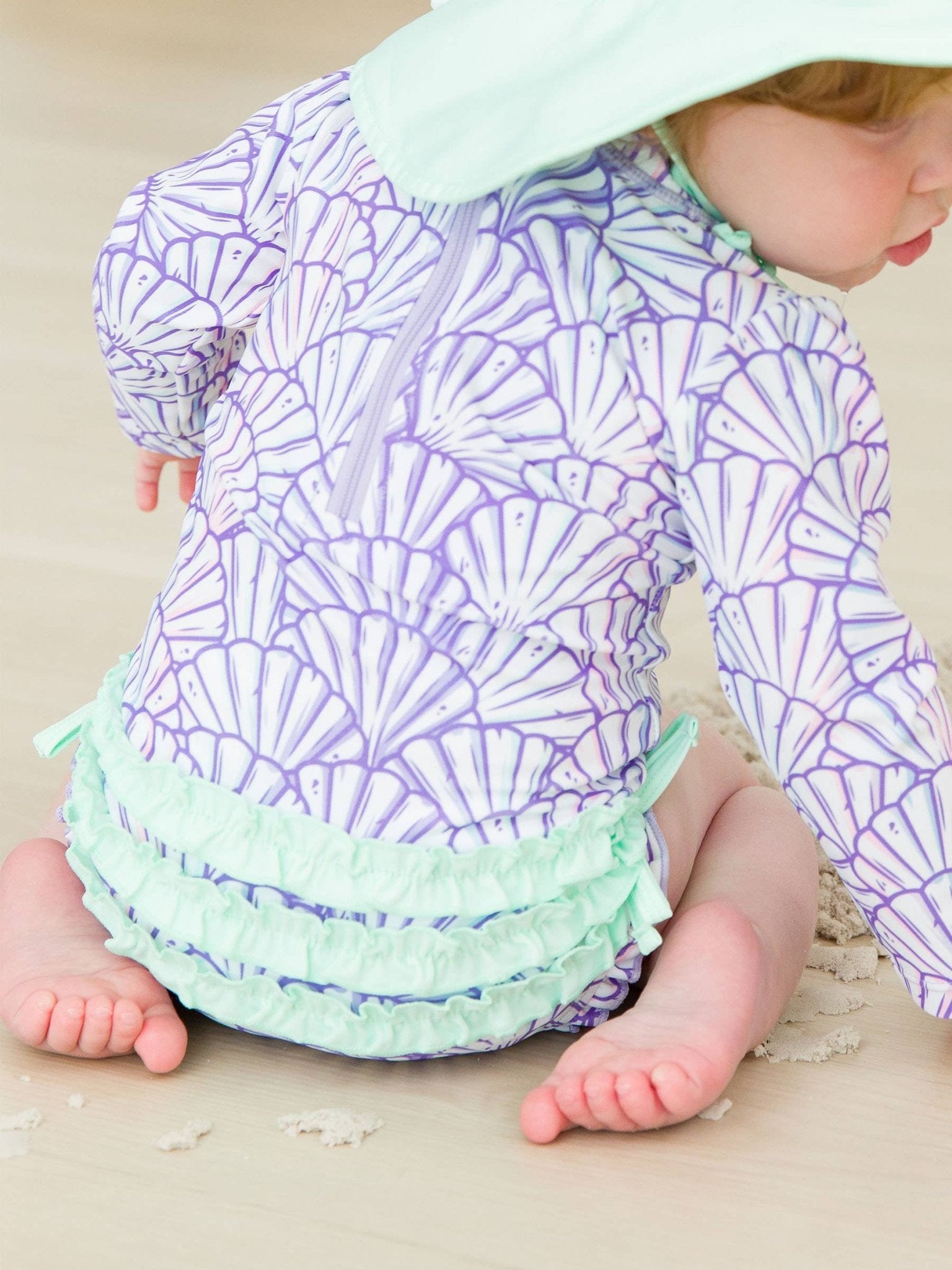 RuffleButts + RuggedButts - Baby Girls Magical Mermaid Long Sleeve One Piece Rash Guard Swimsuit with Signature Rear Ruffles - For All Elements