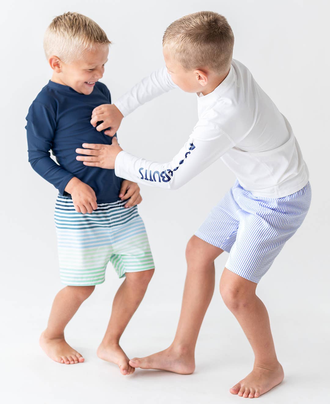 RuffleButts + RuggedButts - Boys Navy Long Sleeve Rash Guard - For All Elements