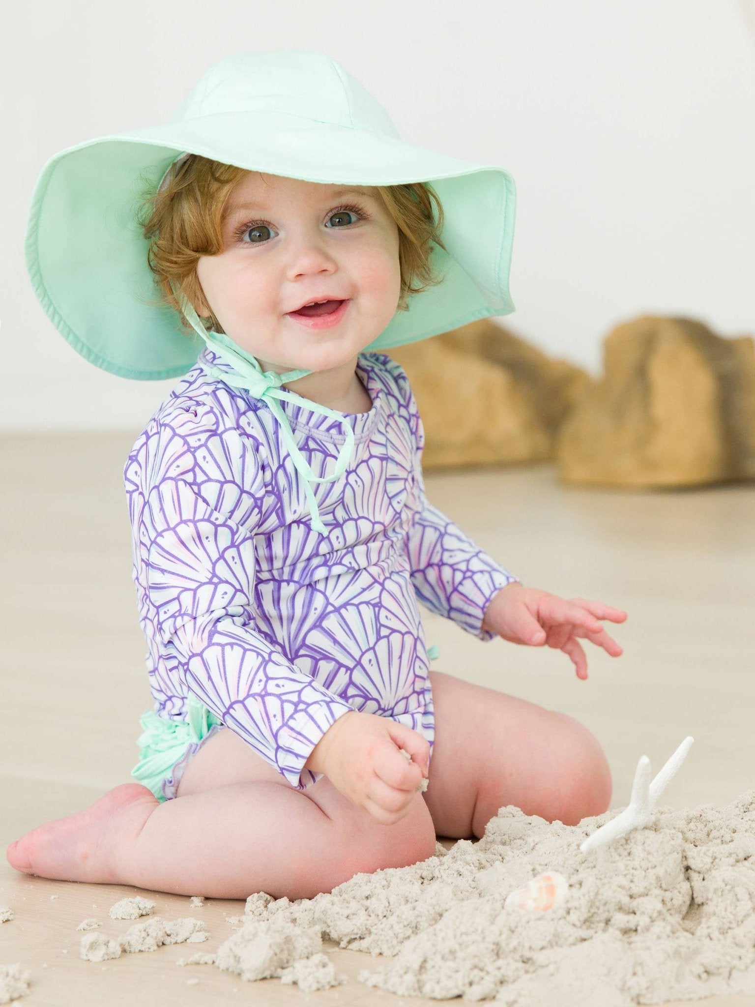 RuffleButts + RuggedButts - Baby Girls Magical Mermaid Long Sleeve One Piece Rash Guard Swimsuit with Signature Rear Ruffles - For All Elements