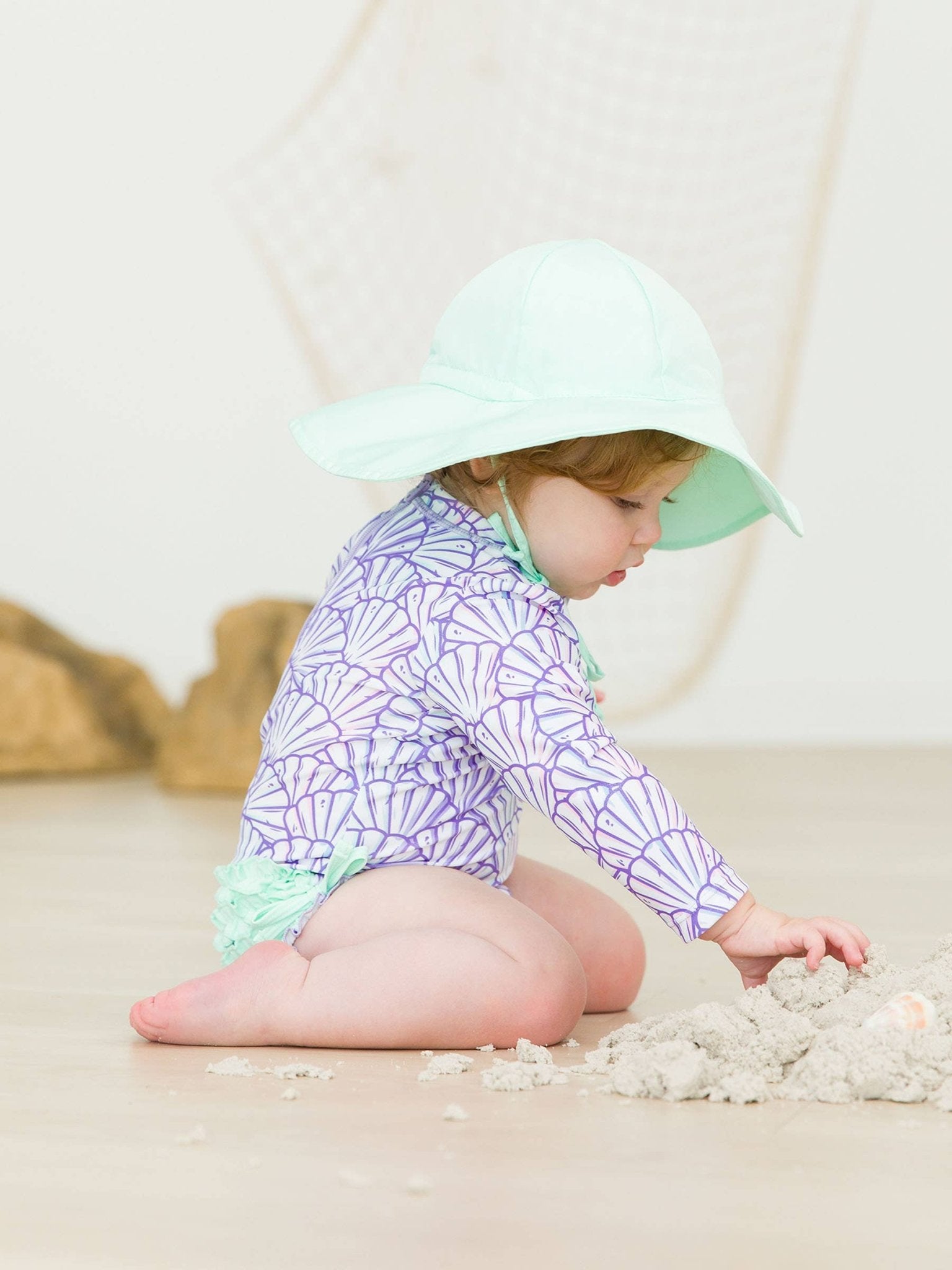 RuffleButts + RuggedButts - Baby Girls Magical Mermaid Long Sleeve One Piece Rash Guard Swimsuit with Signature Rear Ruffles - For All Elements