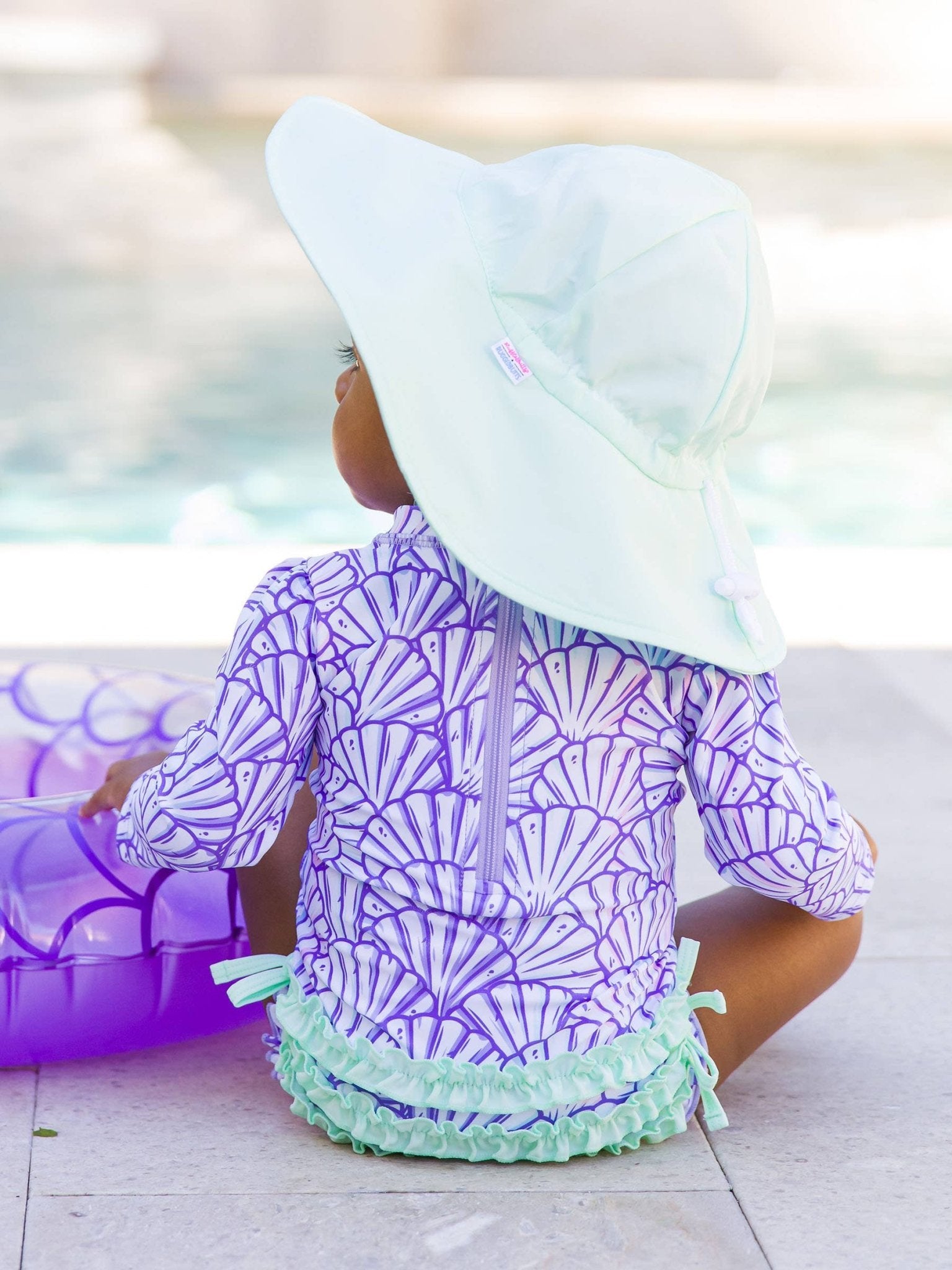 RuffleButts + RuggedButts - Baby Girls Magical Mermaid Long Sleeve One Piece Rash Guard Swimsuit with Signature Rear Ruffles - For All Elements